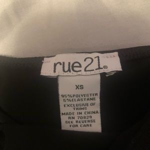 Black tank top with jewels on the straps.